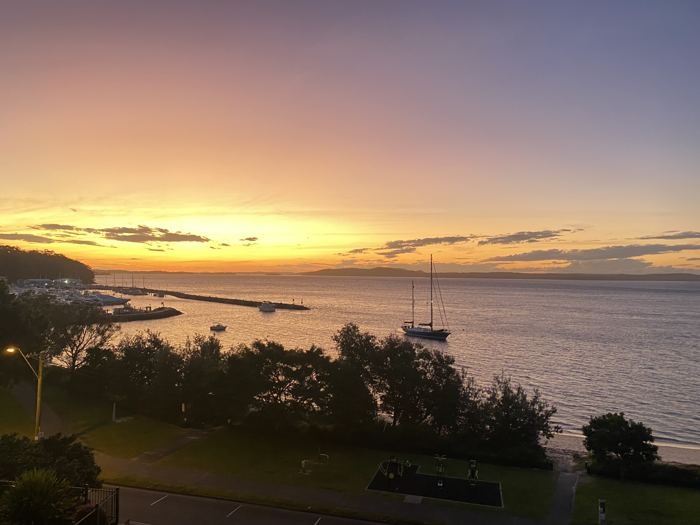 Golden sunset over Port Stephens from the deck at Riviera